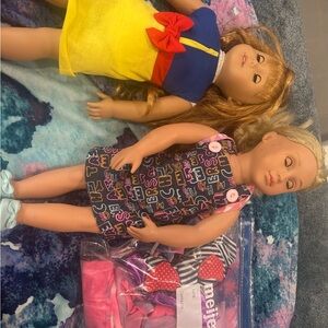 One American Girl doll and One Our Generation doll
